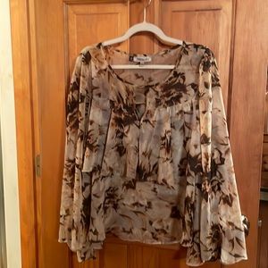 Jennifer Lopez bohemian floral top.